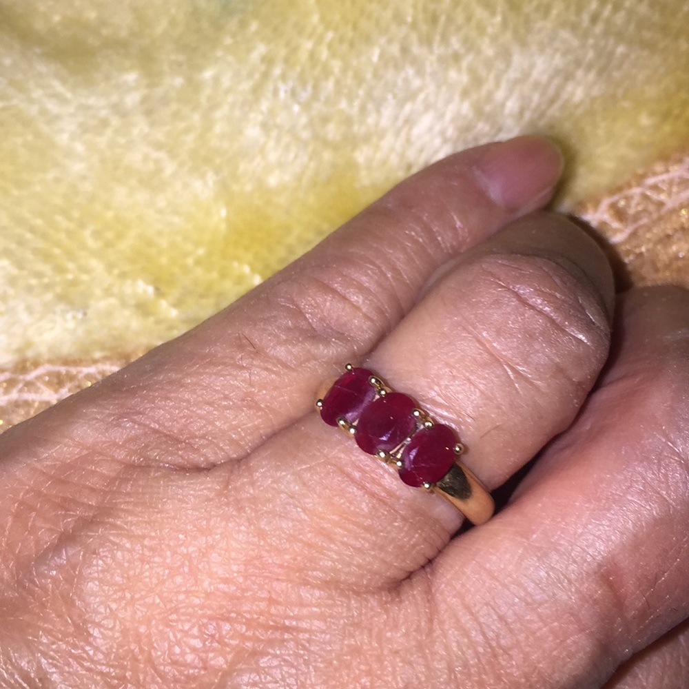 Tree stones size seven Ruby ring 14k solid gold.